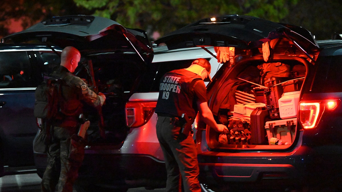 Law enforcement officers at Waterbury mall shooting scene