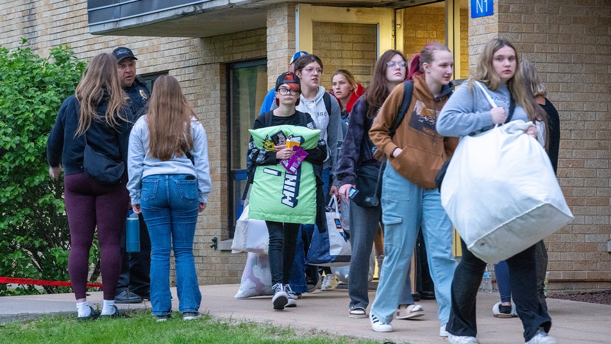 Students leave with their Wilgus Hall belongings