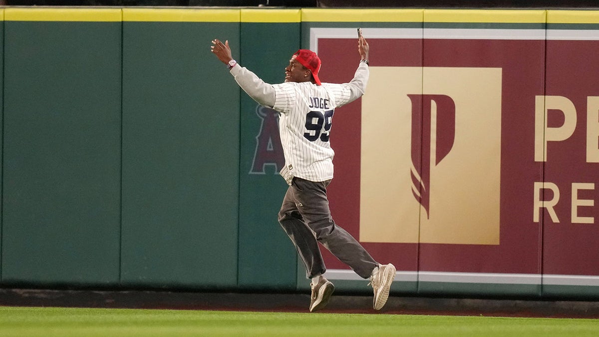 Yankee fan running