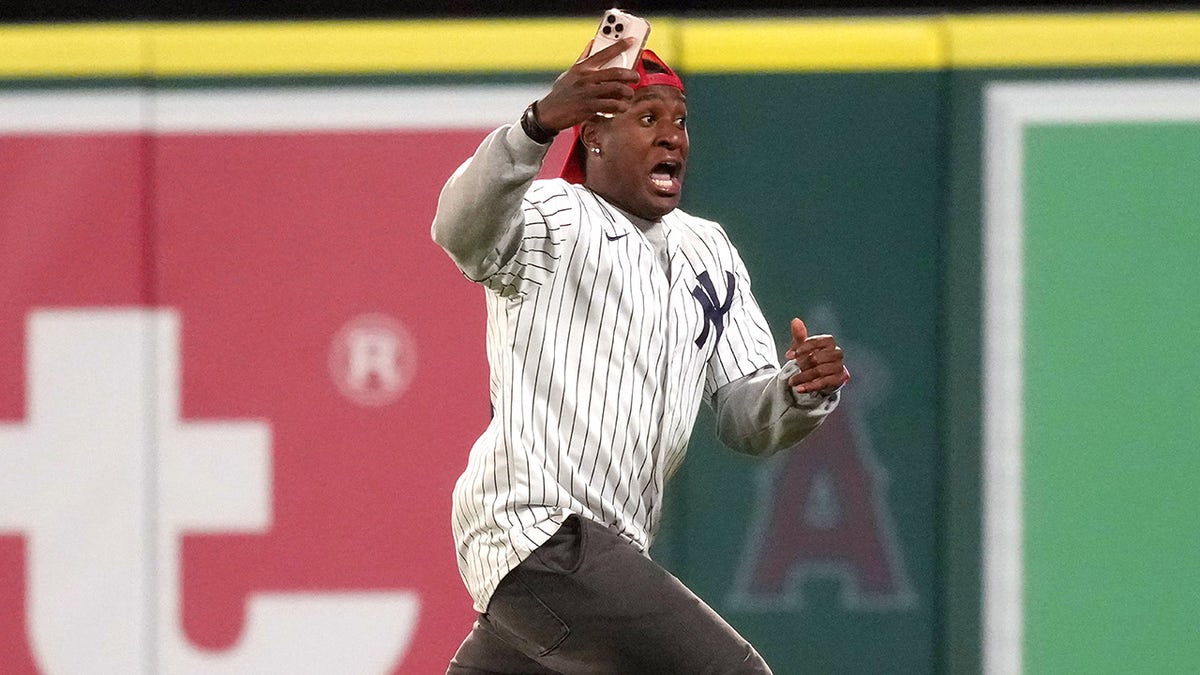 Yankee fan on field