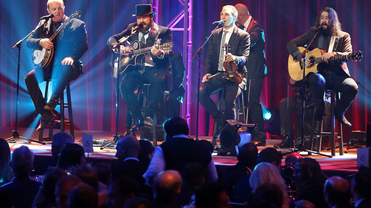 Zac Brown band performing at a USO fundraiser