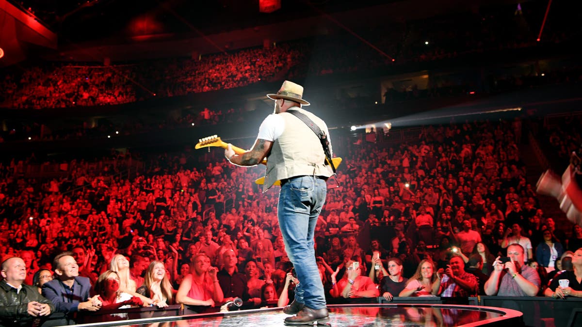 Zac Brown performing for iHeart Radio Music Festival crowd