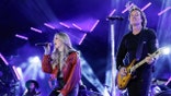 Alana Springsteen and Keith Urban performing on stage together