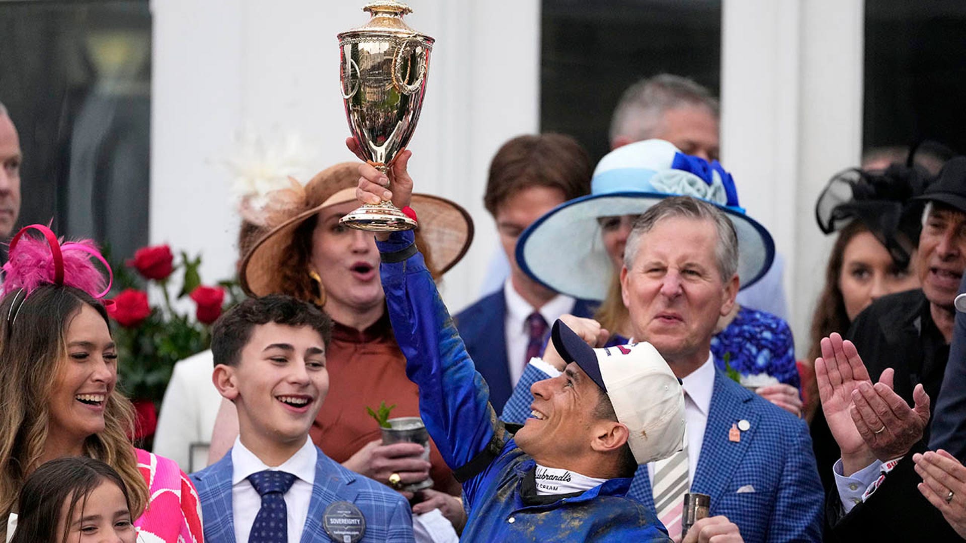 Junior Alvardo raiases the trophy