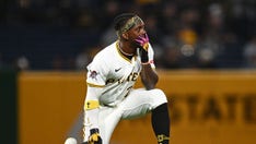 Pirates fan who shockingly flipped over wall onto field identified as ex-college football player