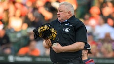 Umpire curses himself out on hot mic after missing call