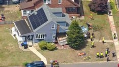 Dramatic video shows dump truck plowing into NJ home after driver suffers medical emergency