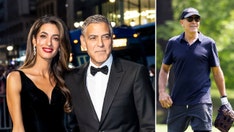 George Clooney appears unbothered playing softball amid reports his wife could be barred from future US visits
