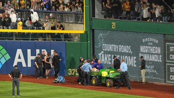 Fan who fell over wall onto field at Pirates game 'awake and alert,' GoFundMe says
