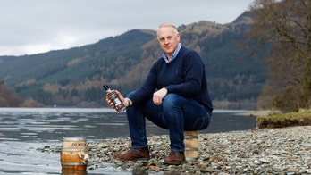 First bottle of 'whisky' matured in casks submerged in Loch Ness sells for over $1,000