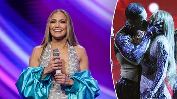 Jennifer Lopez sparks controversy kissing male and female dancers at American Music Awards