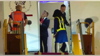 Emmanuel Macron's wife seen shoving him in the face in viral clip as France's first couple arrives in Vietnam