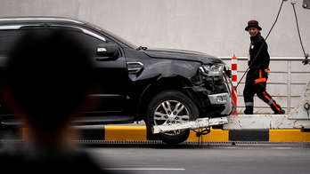 Car crash at airport in the Philippines kills at least 2, including young girl