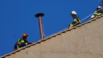 Chimney installed on Sistine Chapel's roof ahead of conclave to pick Pope Francis' successor