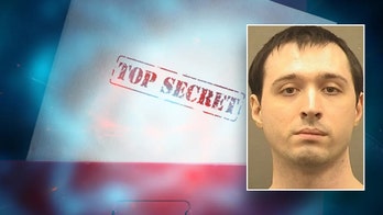 Government employee held after attempt to share classified information with foreign country