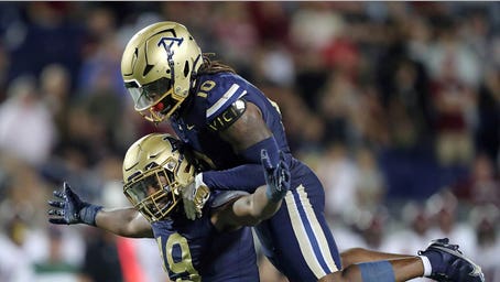 Akron football team banned from postseason games after failing to reach NCAA's minimum academic score