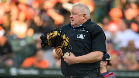 Umpire curses himself out on hot mic after missing call