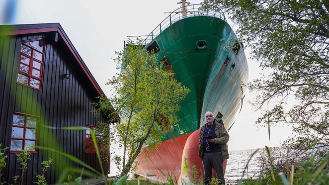 Man awakes to discover 443-foot cargo ship nearly crashed into his home