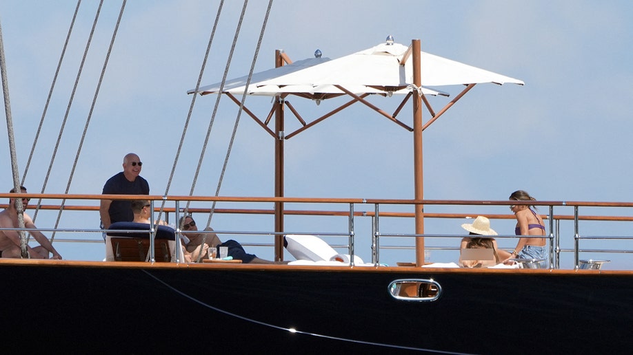Lauren Sanchez and Jeff Bezos with friends on a boat