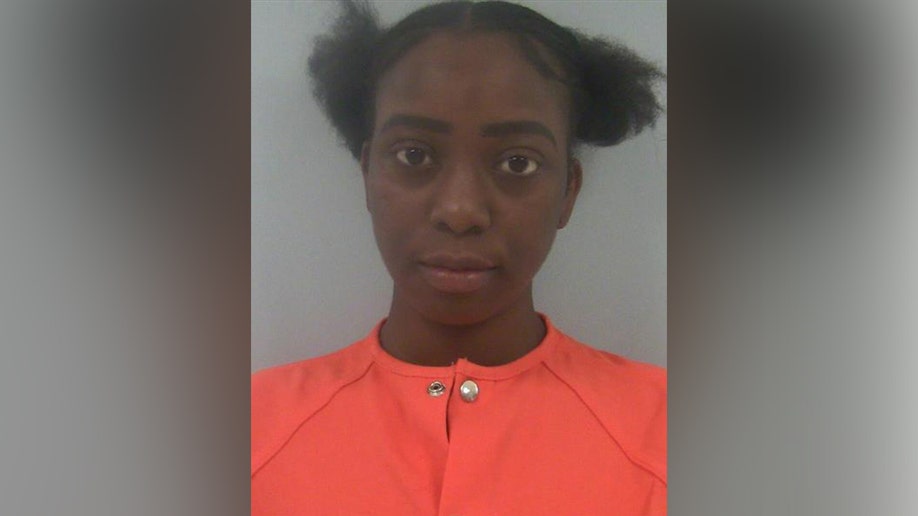 Tyshanea Randolph mugshot in orange jail jumpsuit
