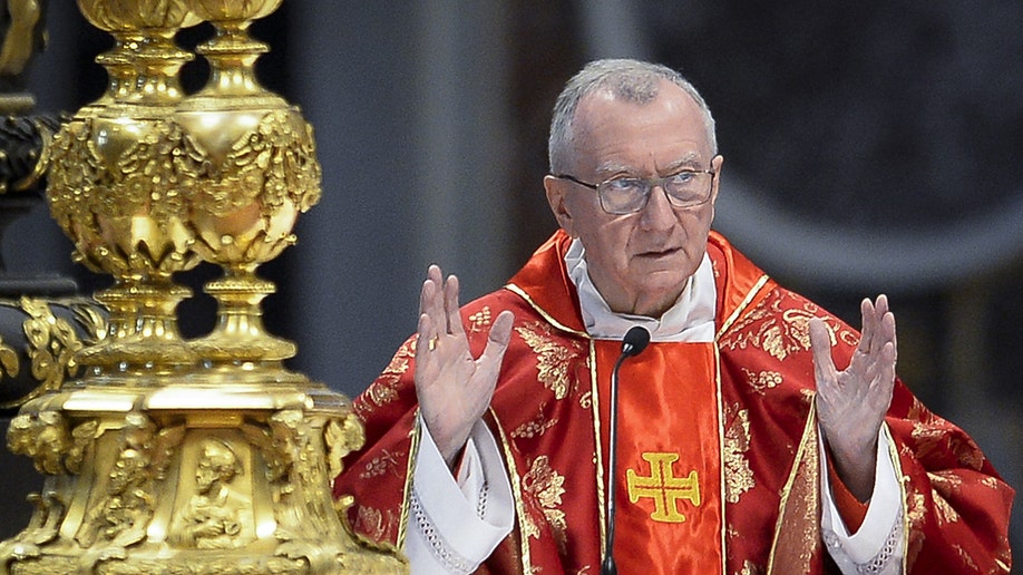 Cardinals Pietro Parolin speaking with his hands up