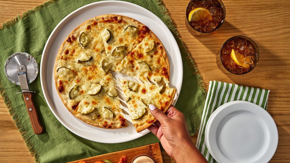 Pizza with dill pickles 