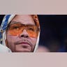 Fat Joe looks on