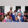 Junior Alvardo raiases the trophy