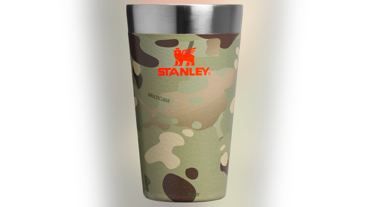 Outdoor enthusiasts and brew  lovers tin  support  their drinks acold  successful  this pint glass. 