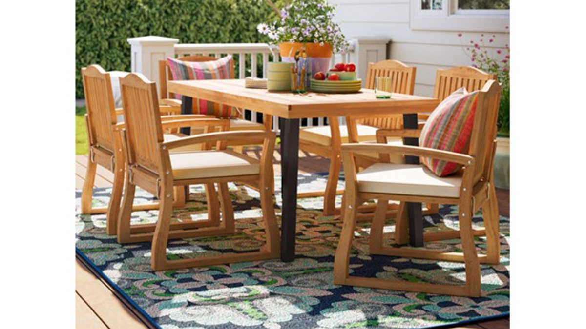 This wooden dining set will look great on any deck or patio. 