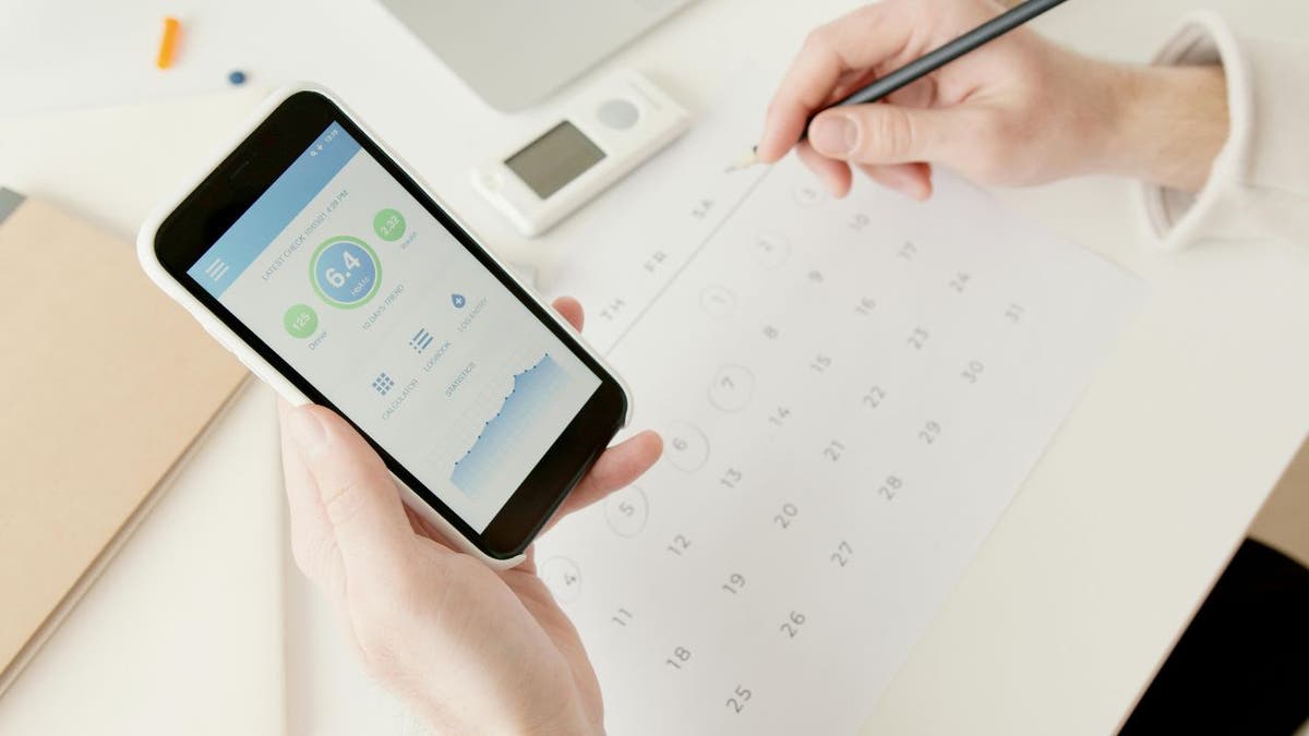 A woman viewing her health app.