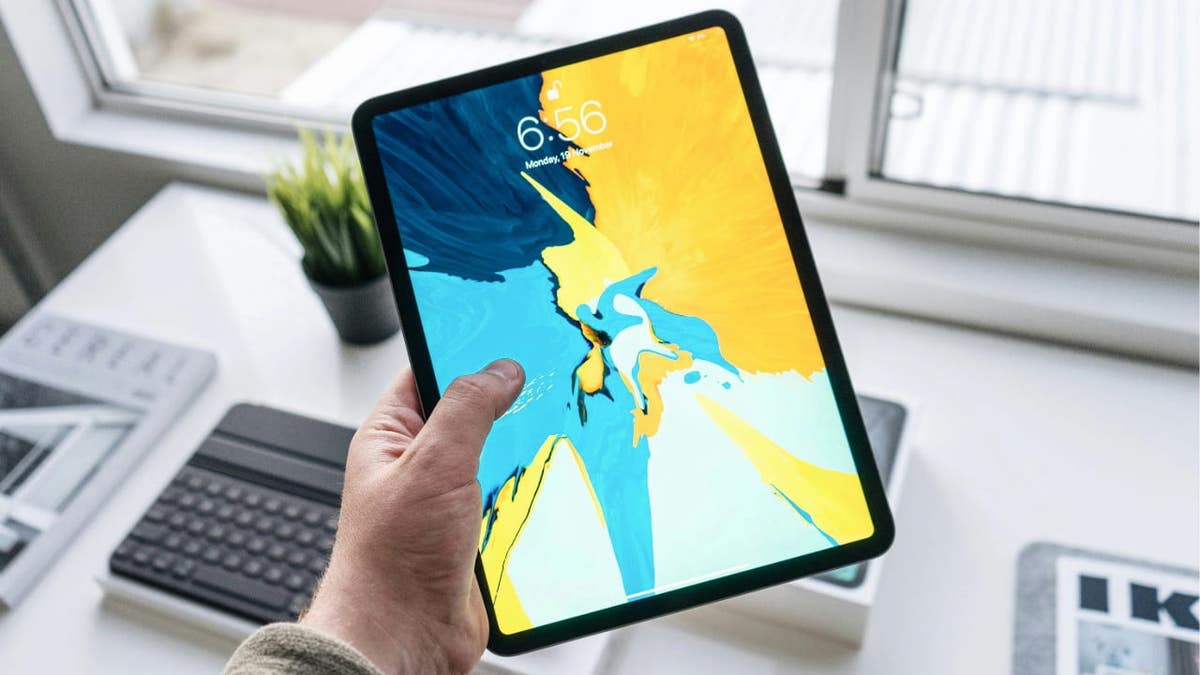 person with tablet