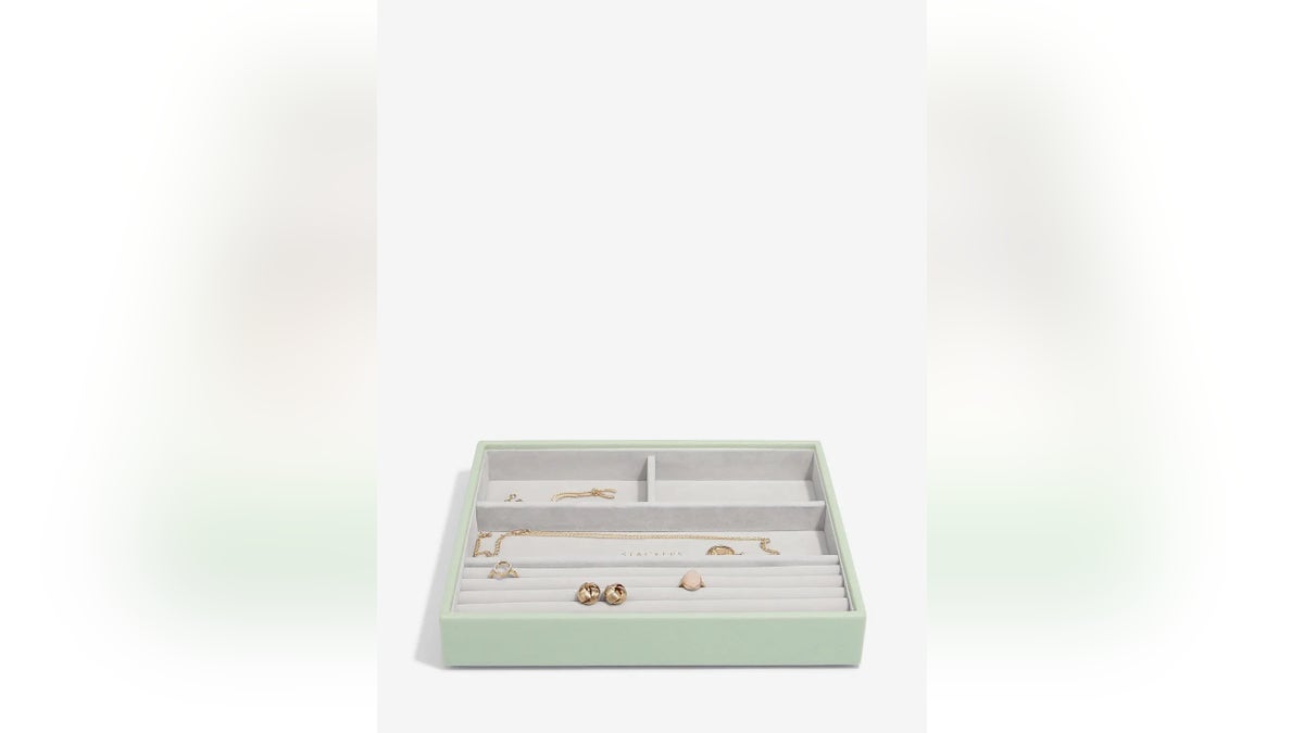Designed specifically for rings and bracelets, this tray stores everything in one compact place.