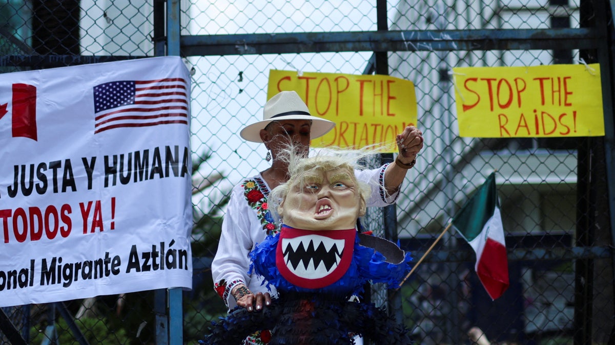 anti-Trump puppet held by protester