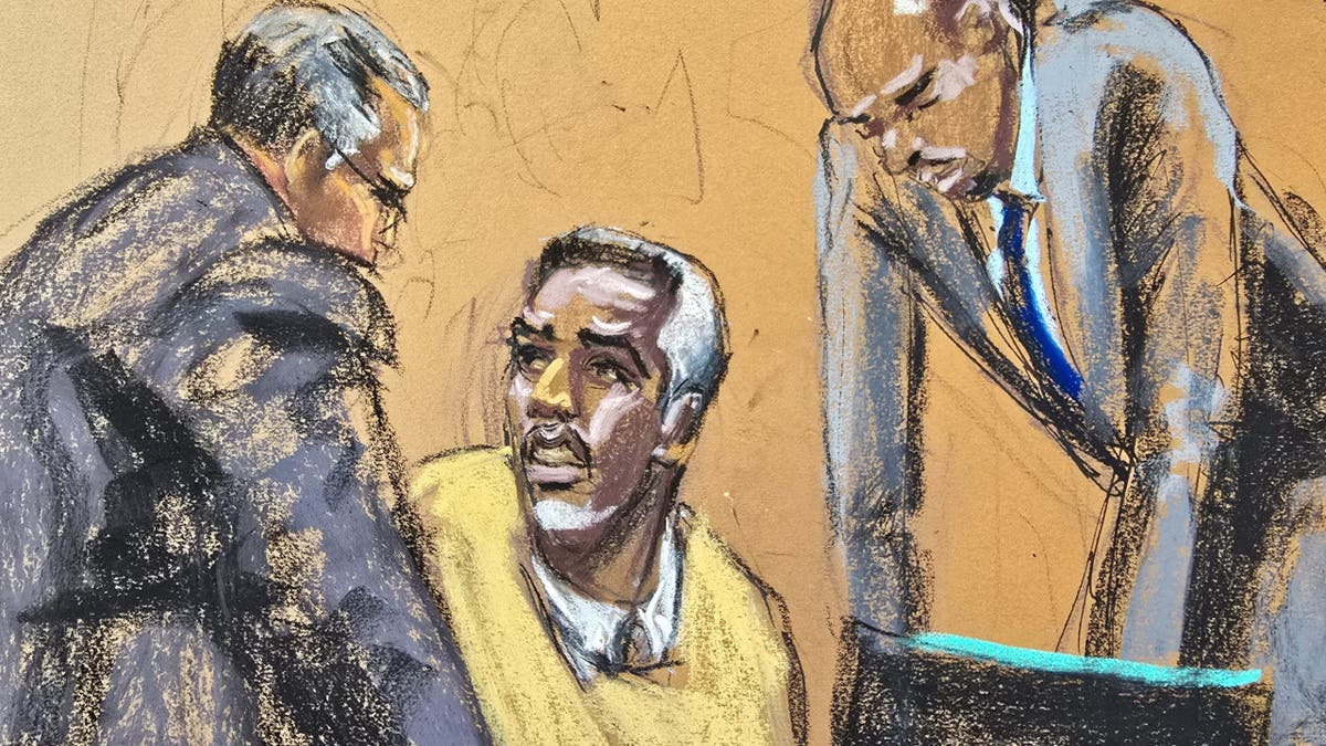 Courtroom sketch of lawyers leaning over Diddy, who is seated. 
