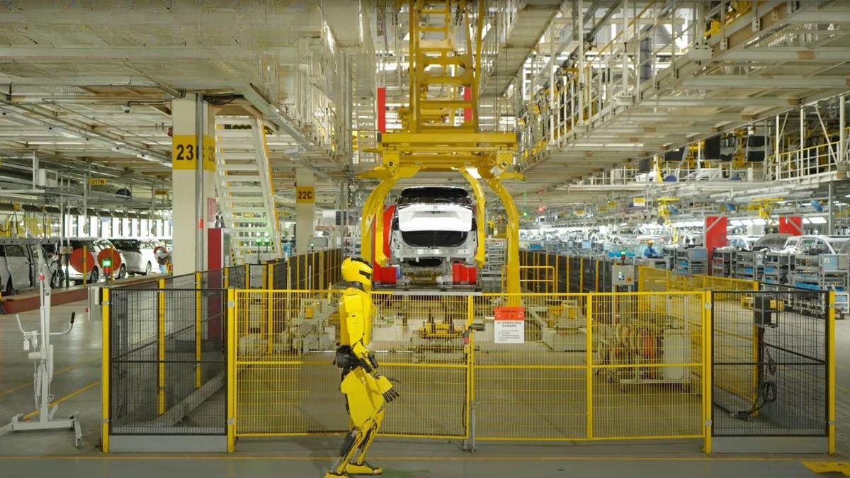 Forerunner K2 "Bumblebee" humanoid robot at the SAIC-GM automotive plant.