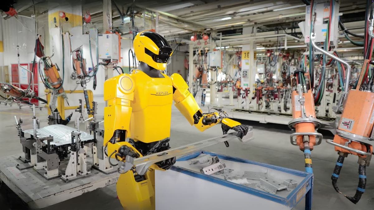 Forerunner K2 "Bumblebee" humanoid robot at the SAIC-GM automotive plant.