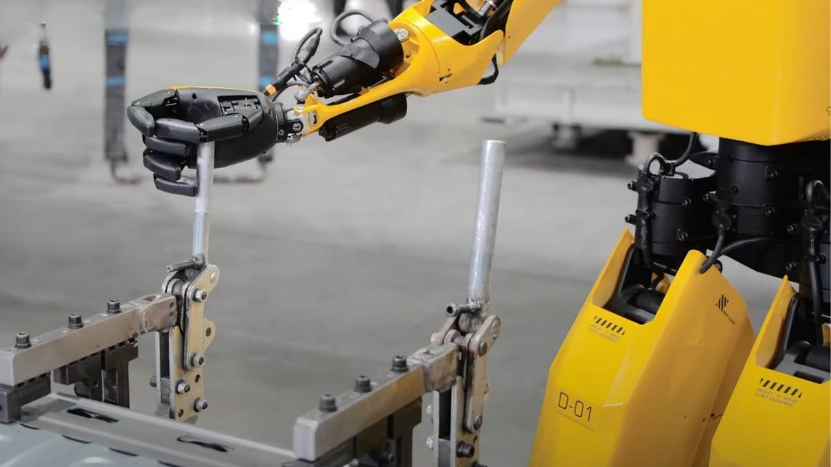 Forerunner K2 "Bumblebee" humanoid robot at the SAIC-GM automotive plant.