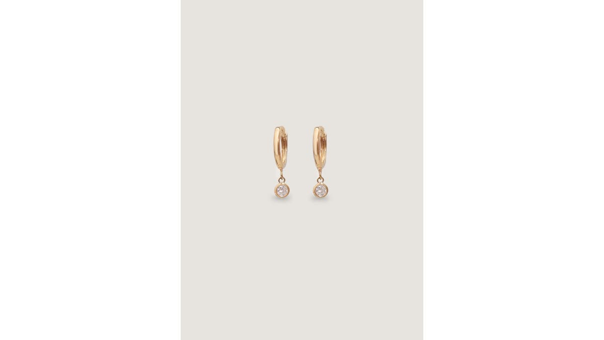 If you don’t mind a splurge, the Kara huggie earrings from Kinn feature natural diamonds set in 14k solid gold.