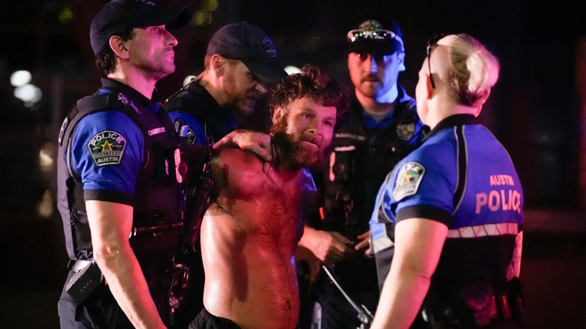 Austin police arrest a protester on Congress Avenue during a protest in Austin to express opposition to federal immigration raids and show solidarity with demonstrators in Los Angeles Monday, June 9, 2025.