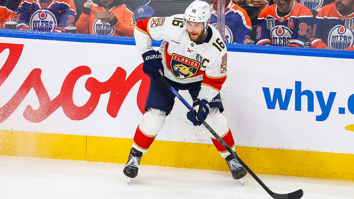 Aleksander Barkov looks to pass