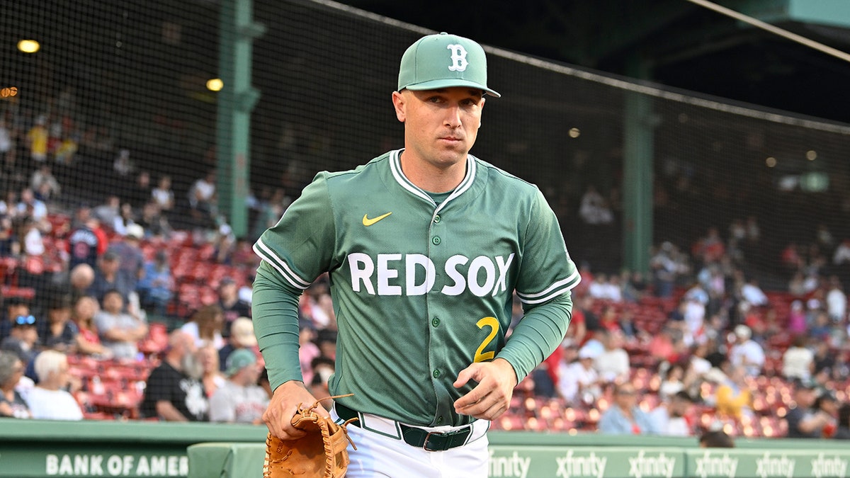 Alex Bregman runs onto field