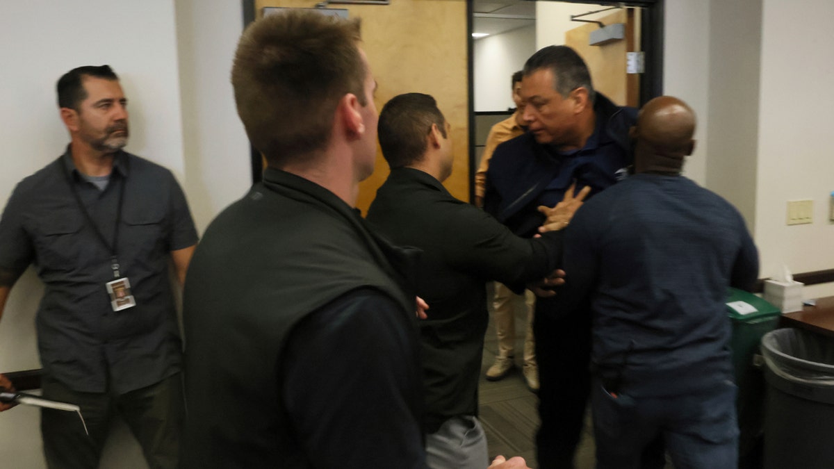 Sen. Alex Padilla escorted
