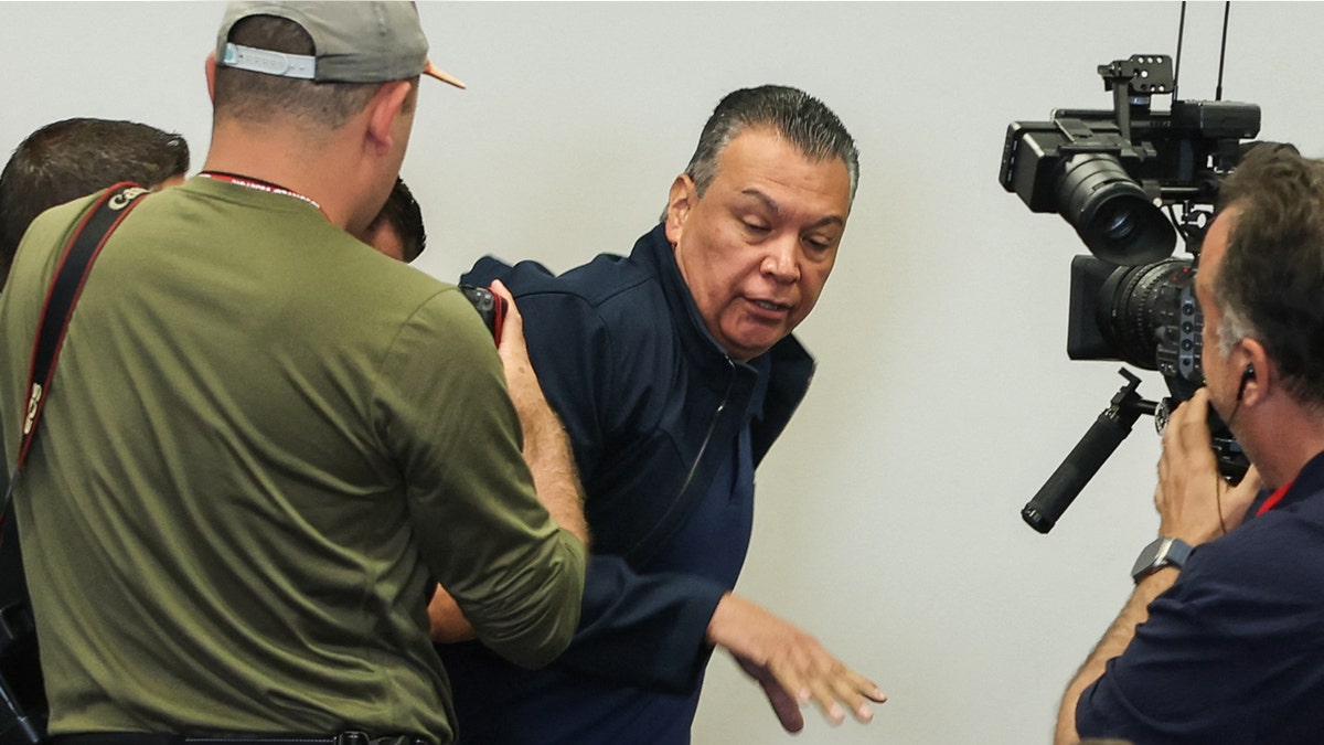 Sen. Alex Padilla escorted