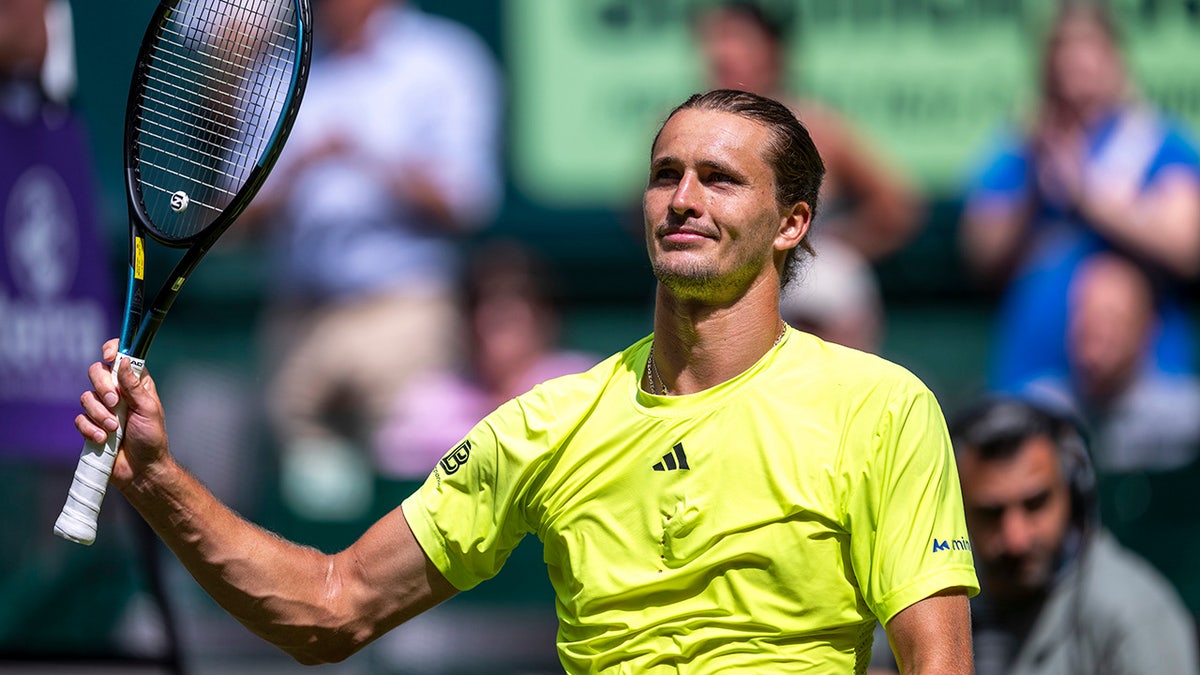 Alexander Zverev raises racket