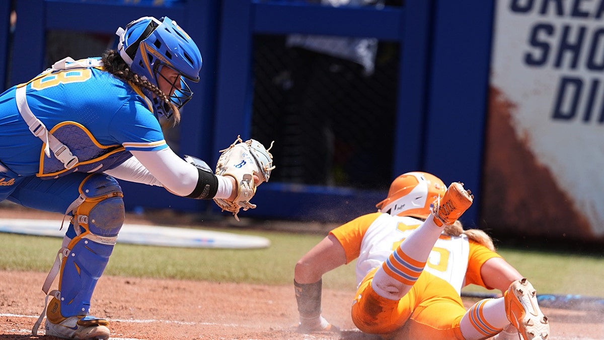 UCLA catcher misses the tag