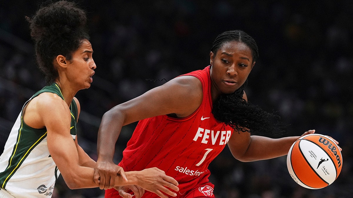 Aliyah Boston dribbles