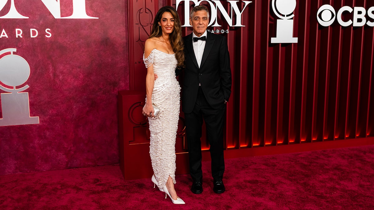 George and Amal Clooney on the red carpet at the Tony Awards.