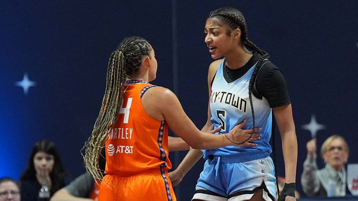 Angel Reese and Bria Hartley exchange words