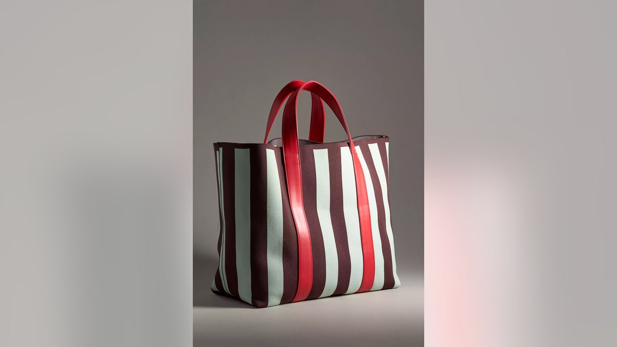 This striped canvas tote combines classic seaside style with practicality.